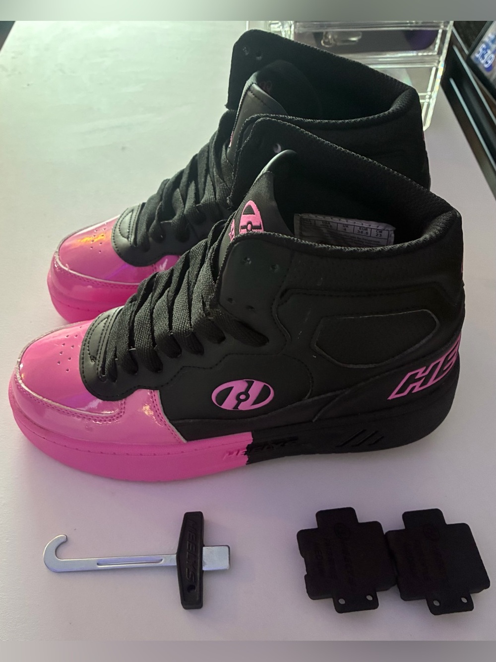 Youth Heelys Black and Pink High-Top Roller Sneakers